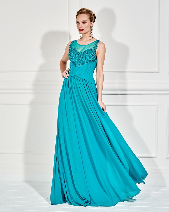 Long evening dress with beaded bust and transparency in the back